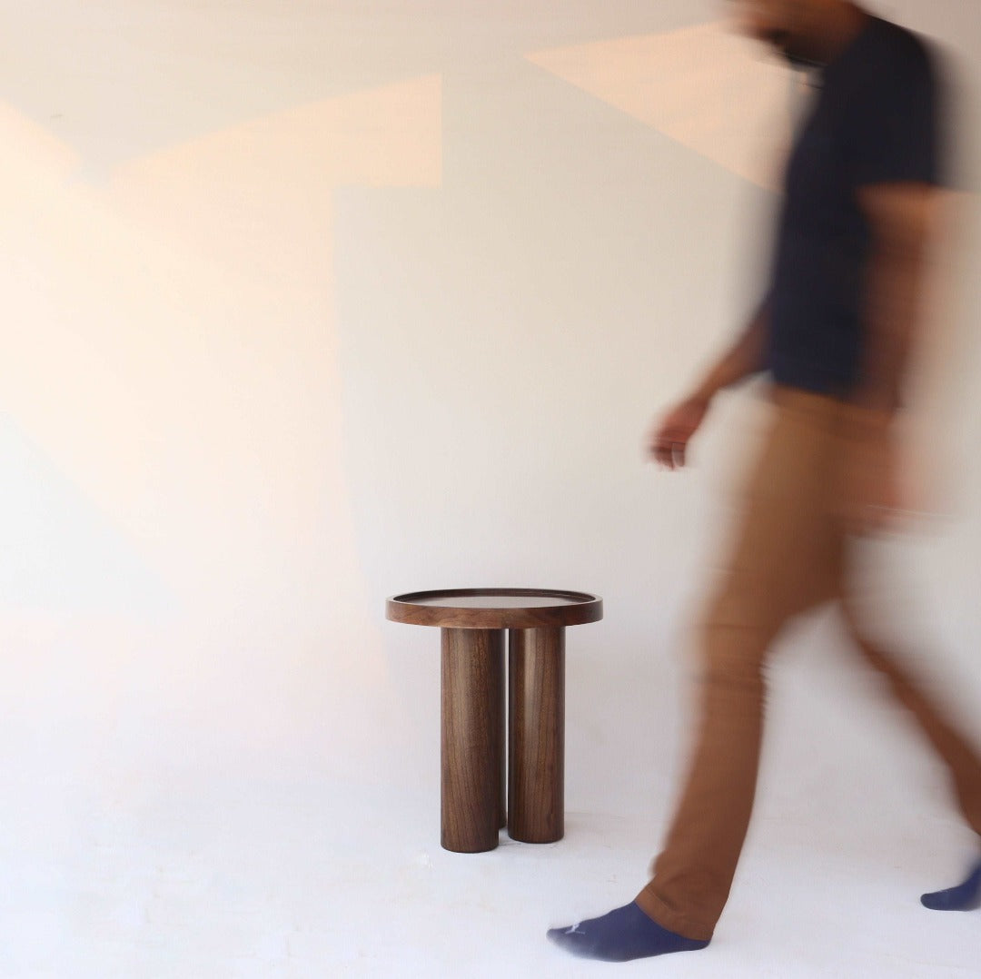 Discover understated elegance with our Three-Legged Table, meticulously crafted from solid red oak. Its minimalist design exudes charm and versatility, enhancing any room with natural beauty.