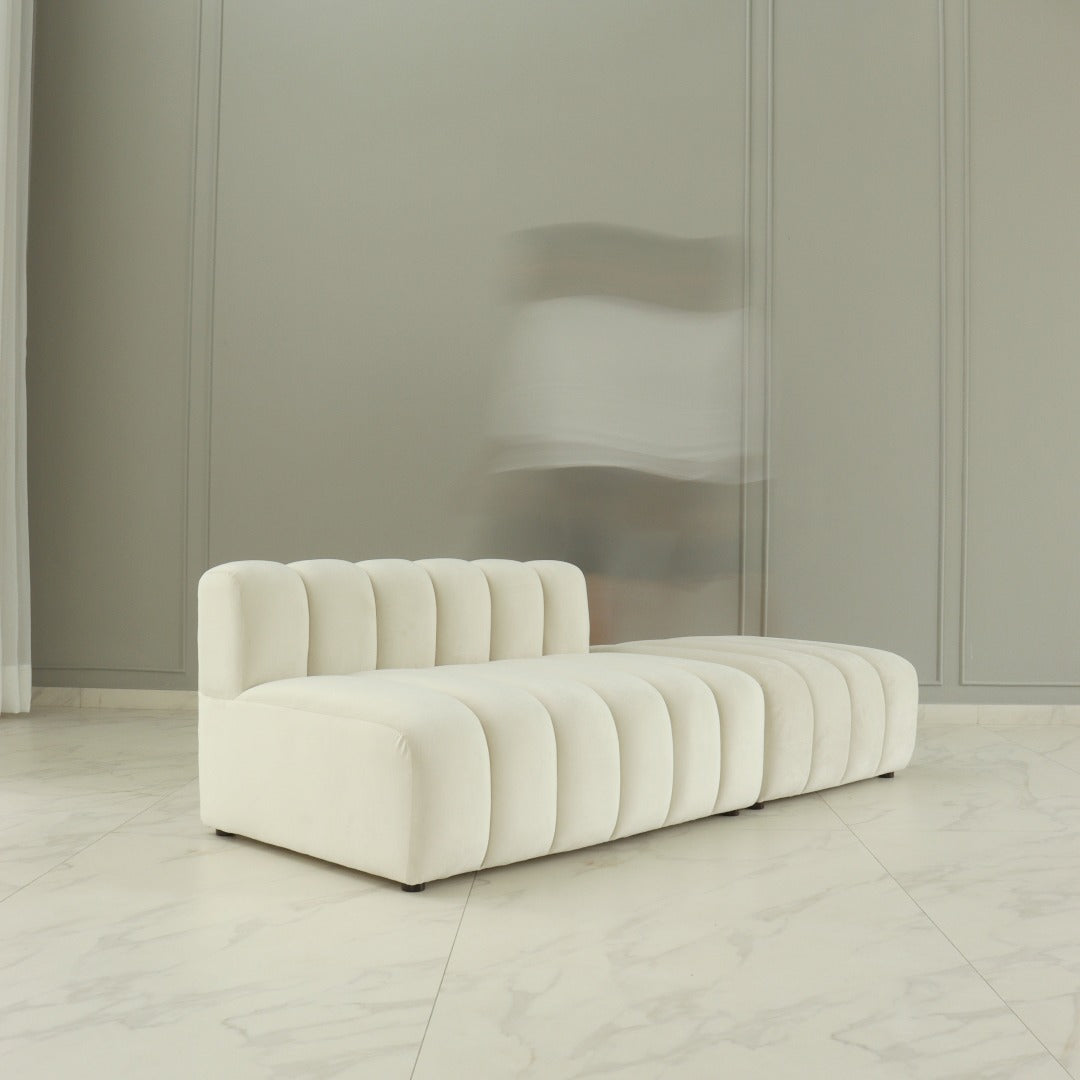 A chic and modular sofa, characterized by its contemporary design and versatile configuration options. Its sleek lines and modular components allow for customizable arrangements, providing both style and flexibility to adapt to various living spaces and seating preferences.