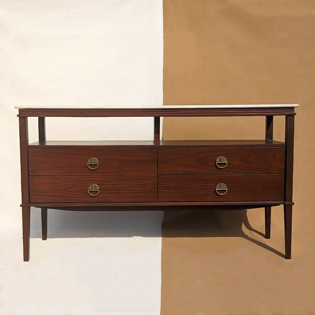 A console featuring a luxurious marble top, exuding elegance and sophistication. The smooth, polished surface of the marble adds a touch of opulence to the console's design, making it a stylish statement piece for any entryway, hallway, or living room.