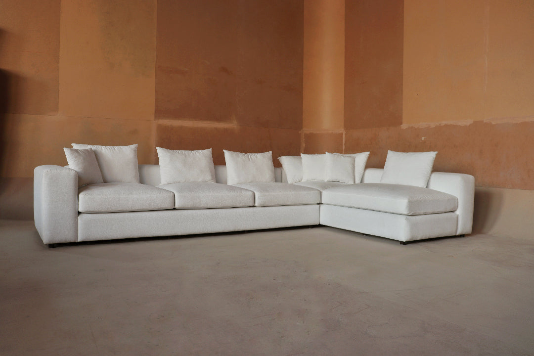 Monaco Sectional Sofa - A modern and spacious sectional designed for both comfort and style, featuring plush cushions, clean lines, and a minimalist aesthetic. Perfect for large living spaces, offering a cozy and elegant seating solution.