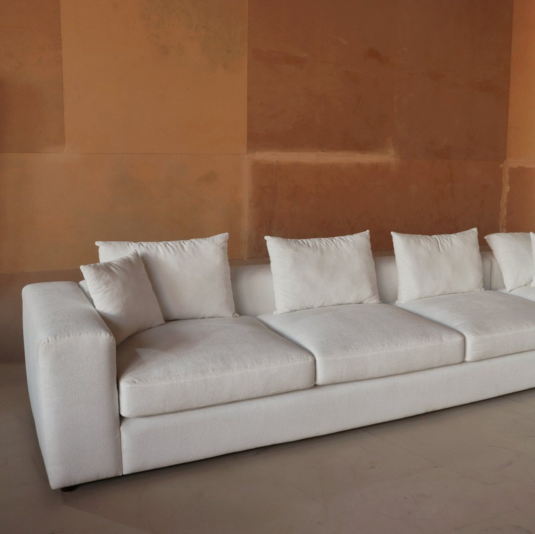 Monaco Sectional Sofa - A modern and spacious sectional designed for both comfort and style, featuring plush cushions, clean lines, and a minimalist aesthetic. Perfect for large living spaces, offering a cozy and elegant seating solution.
