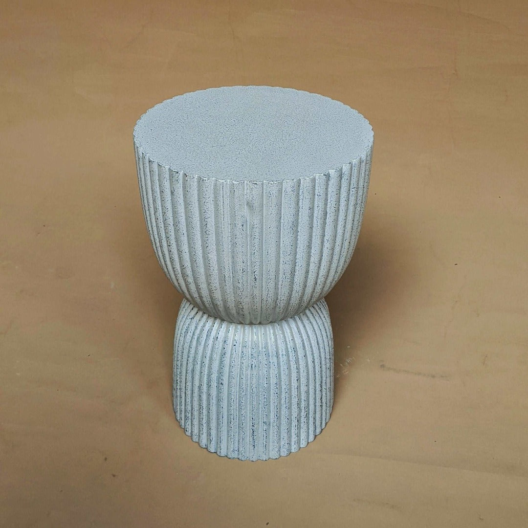 Round Fluted Table: A striking sculptural side table designed to command attention and elevate any space.