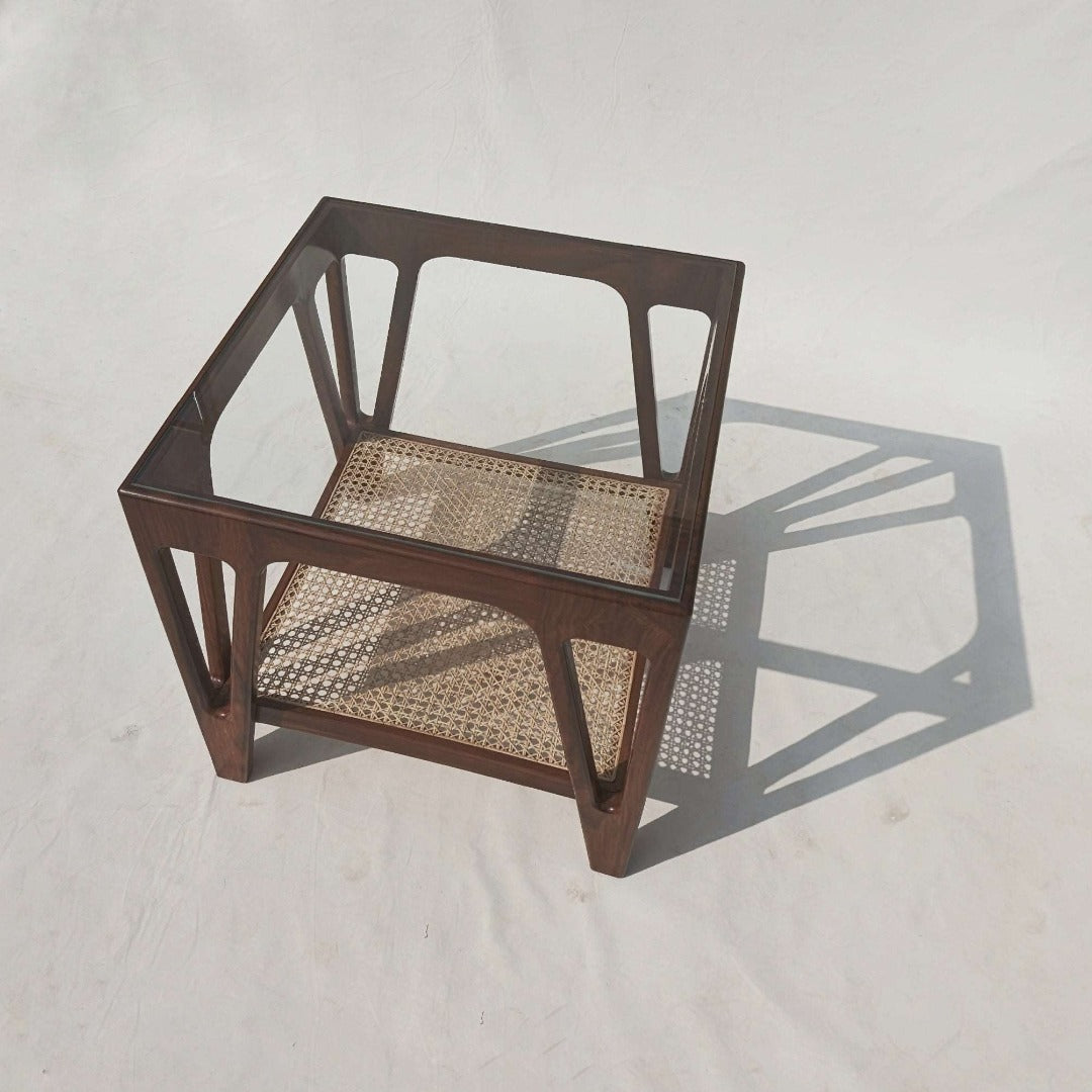Elevate your space with our Cane End Table, expertly crafted from solid Indian rosewood and adorned with handcrafted rattan webbing. A fusion of natural beauty and artisanal craftsmanship, perfect for adding warmth and texture to any room.