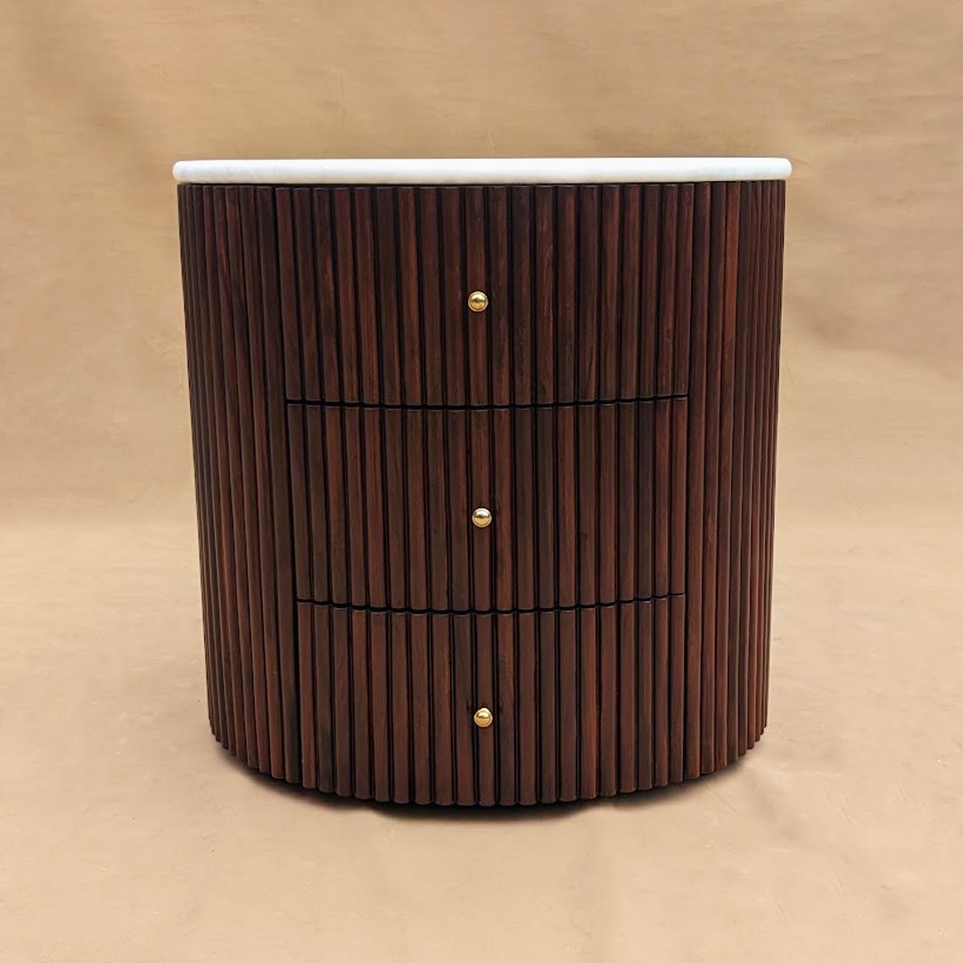 Nightstands featuring marble tops, ridged design, and gold hardware, combining elegance with modern flair. The luxurious marble tops add sophistication, while the ridged detailing and gold hardware accents enhance visual interest and elevate the overall aesthetic of these stylish bedside tables.