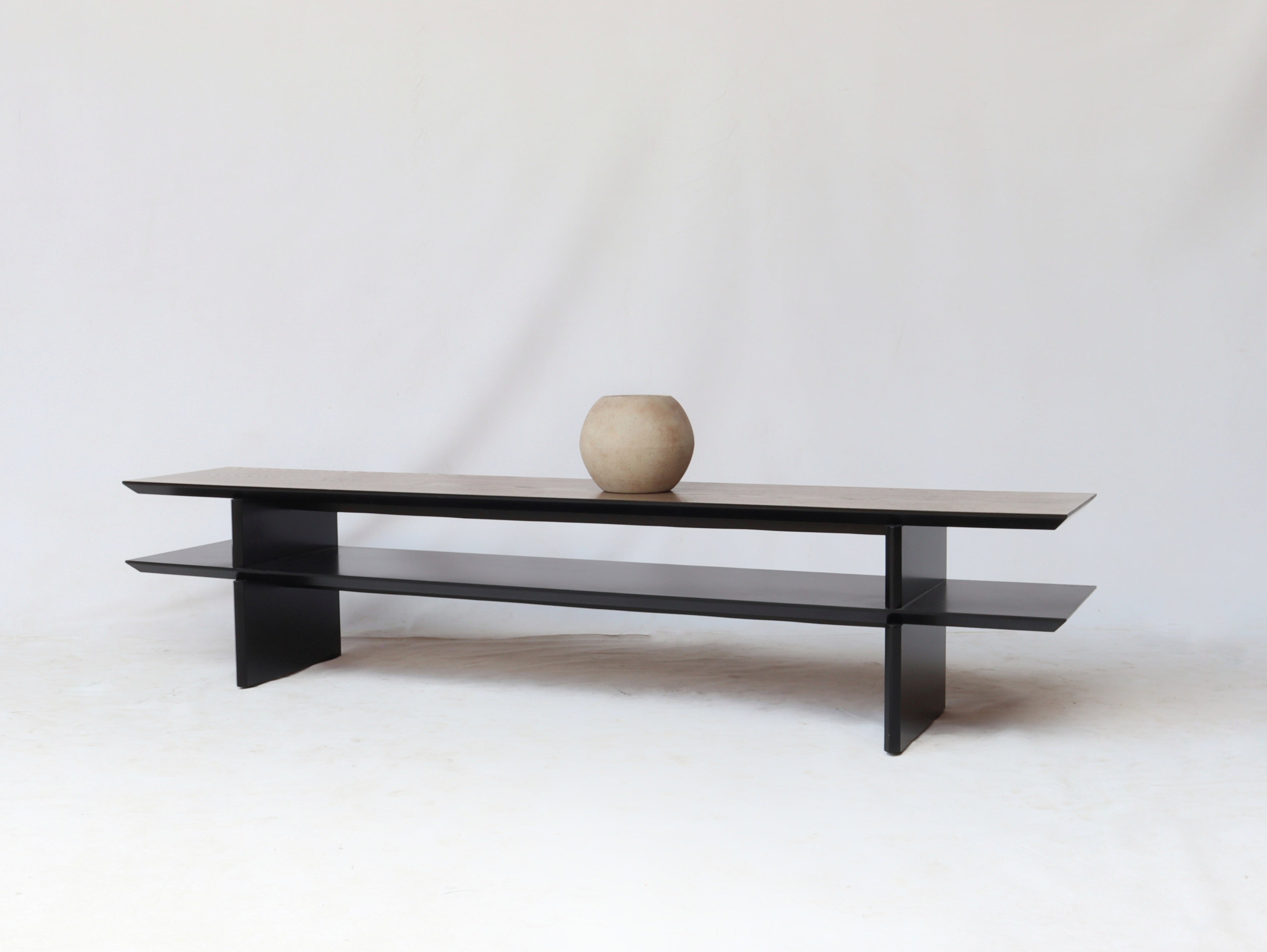 Behind a sofa console