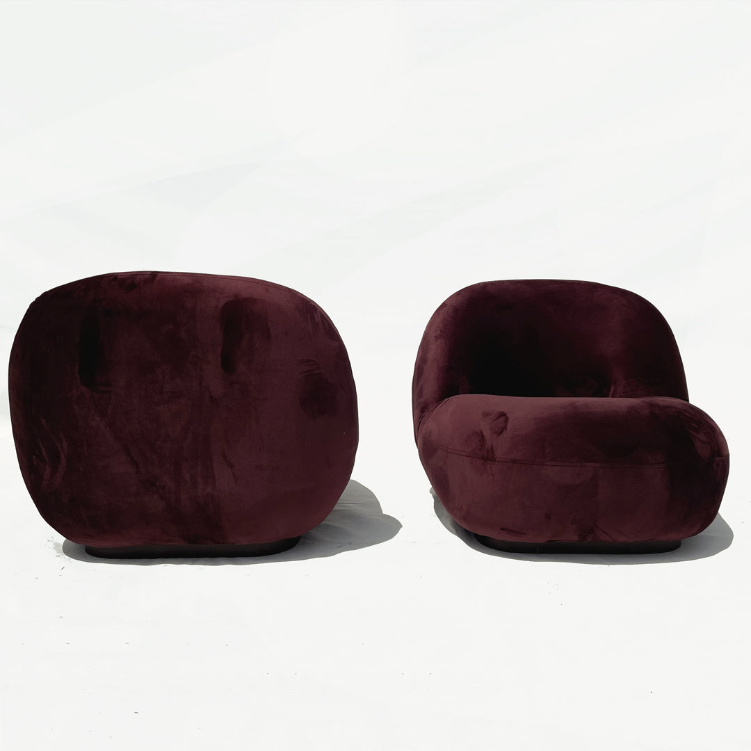 Introducing the Pacha Lounge Chair by Pierre: A timeless icon of comfort and style. Its sculptural form and plush upholstery make it the perfect statement piece for any modern interior