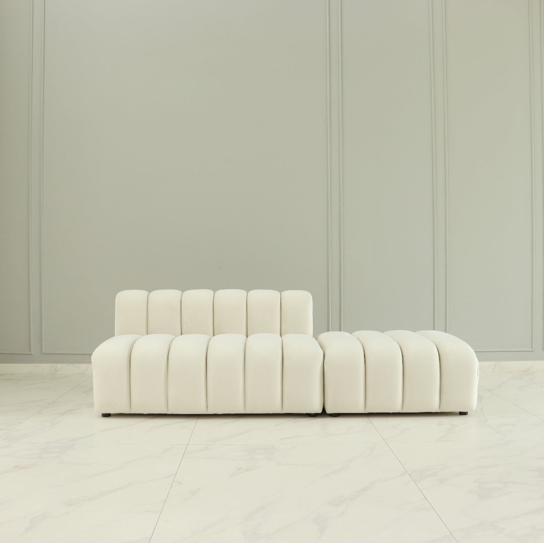  A chic and modular sofa, characterized by its contemporary design and versatile configuration options. Its sleek lines and modular components allow for customizable arrangements, providing both style and flexibility to adapt to various living spaces and seating preferences.