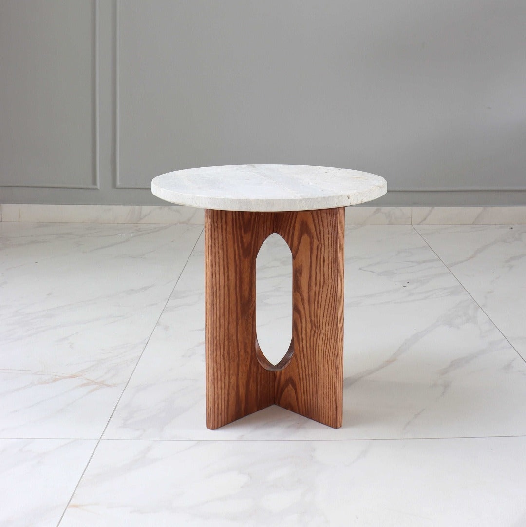 Embrace timeless elegance with our Travertine Table, featuring natural travertine stone and solid wood construction. A fusion of nature's beauty and craftsmanship, perfect for any space.