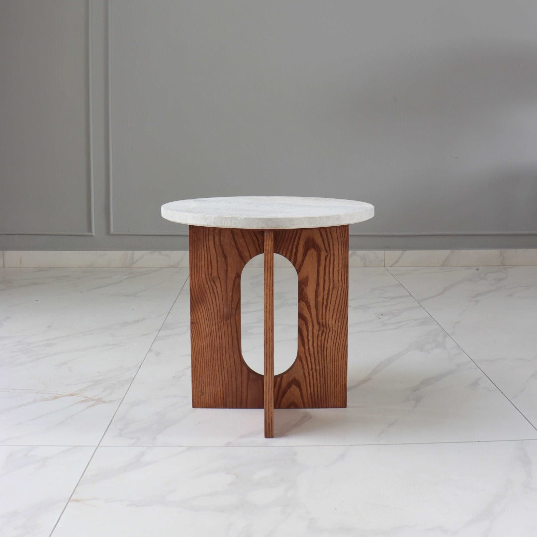 Embrace timeless elegance with our Travertine Table, featuring natural travertine stone and solid wood construction. A fusion of nature's beauty and craftsmanship, perfect for any space.
