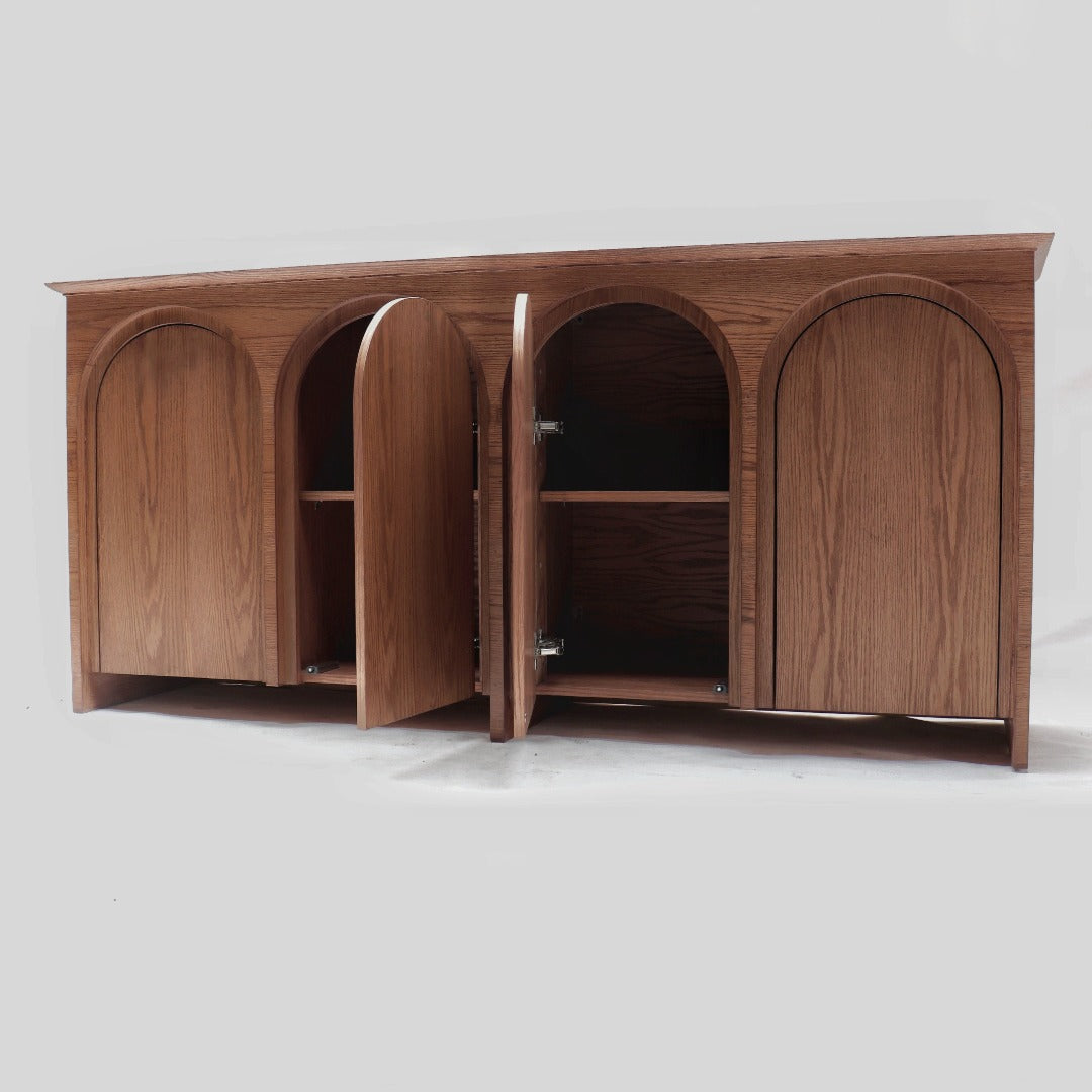 Elevate your space with our Statement Sideboard, crafted from premium red oak veneer and solid red oak. Designed with an arch as a nod to classic furniture, its elegant yet simple design offers ample storage while making a stylish statement in your home.