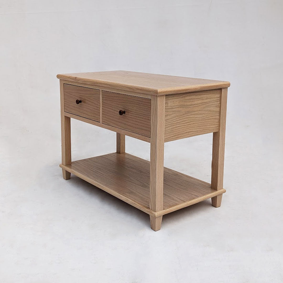 Bleached oak nightstands with storage, offering both style and functionality for any bedroom. The bleached oak finish adds a light and airy feel to the nightstands, while the storage compartments provide convenient space for bedside essentials, keeping the room organized and clutter-free.