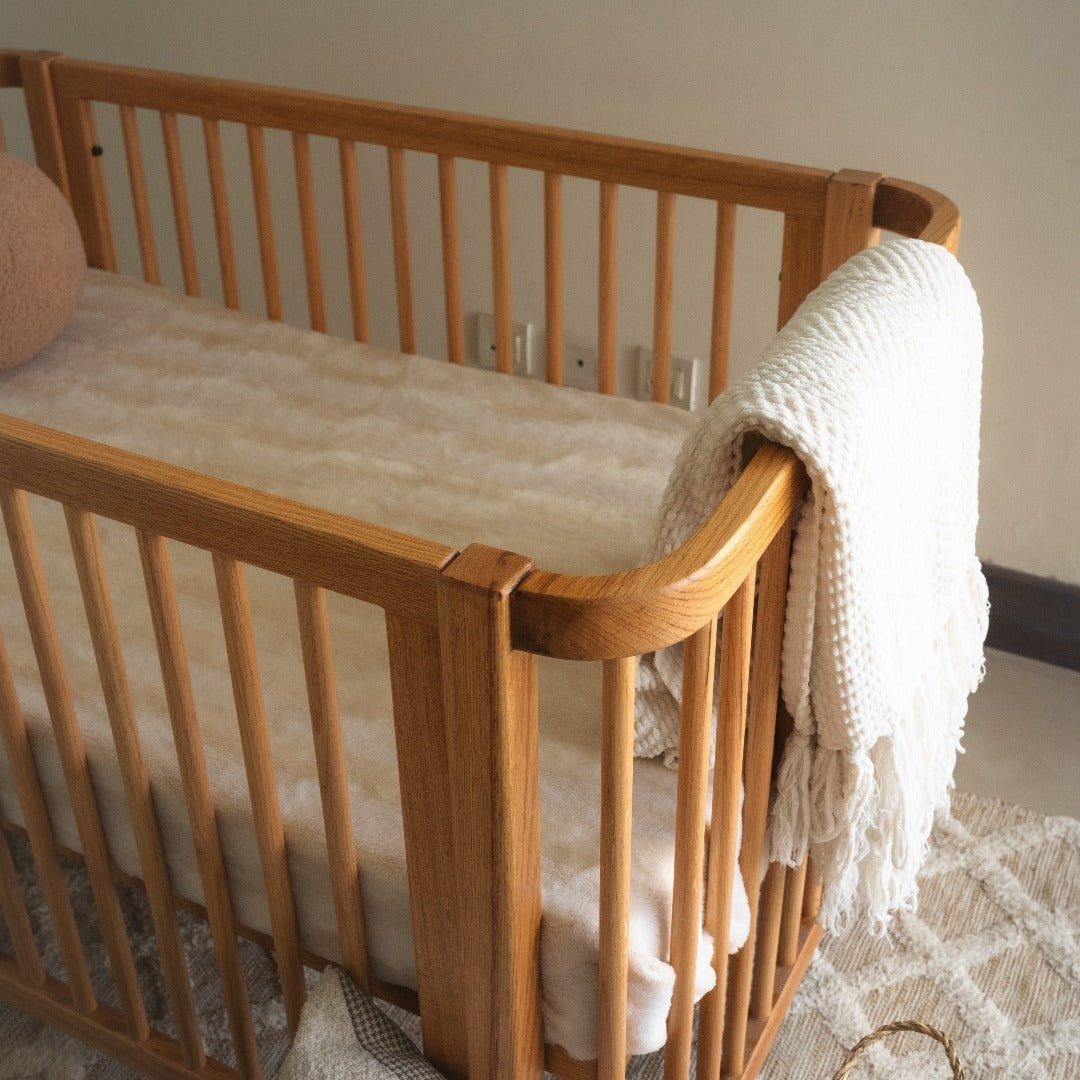 Convertible crib seamlessly adjusts size to grow with your child - from infancy to toddlerhood