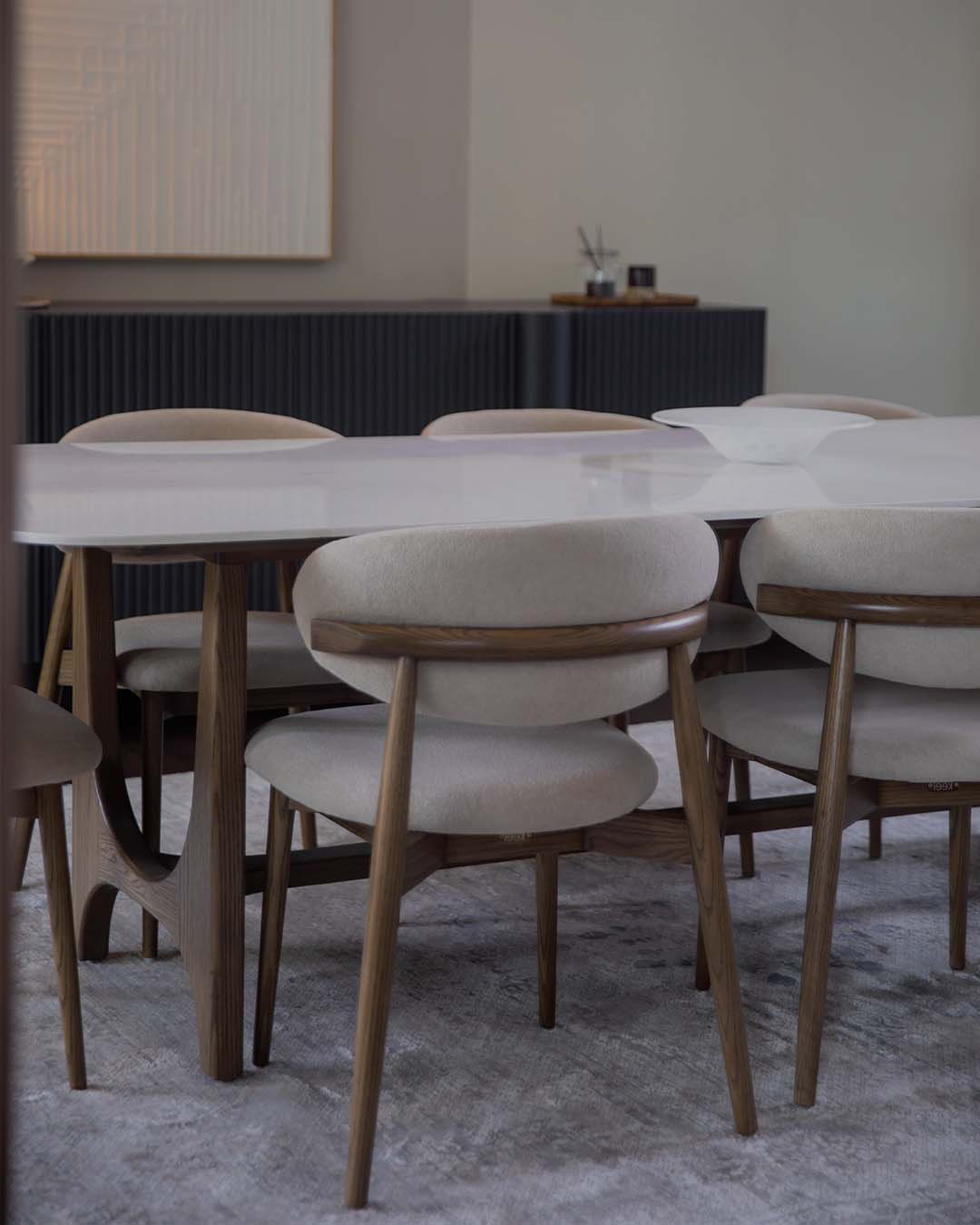 Dining table with chairs in a modern interior setting