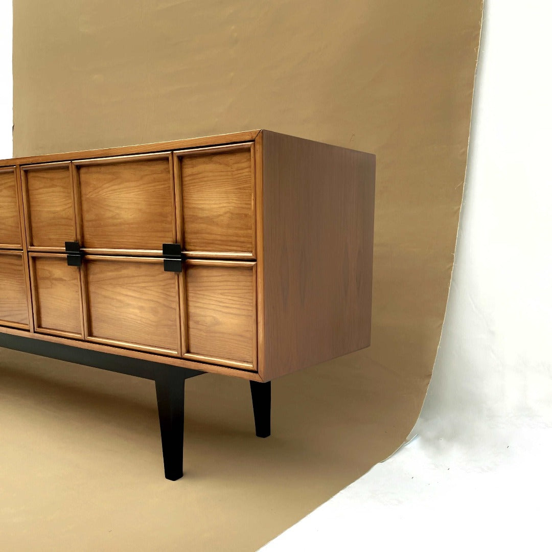 Functional Console with Six Drawers: Designed for ample storage, featuring custom steel handles and crafted from Red Oak Veneer for a sleek finish