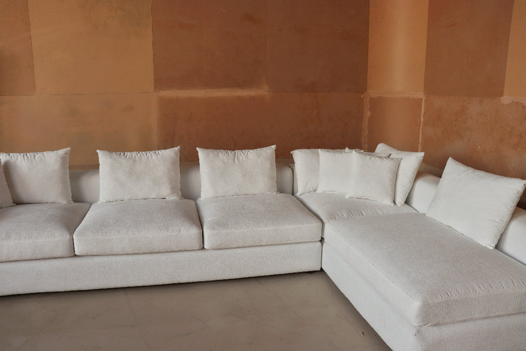Monaco Sectional Sofa - A modern and spacious sectional designed for both comfort and style, featuring plush cushions, clean lines, and a minimalist aesthetic. Perfect for large living spaces, offering a cozy and elegant seating solution.