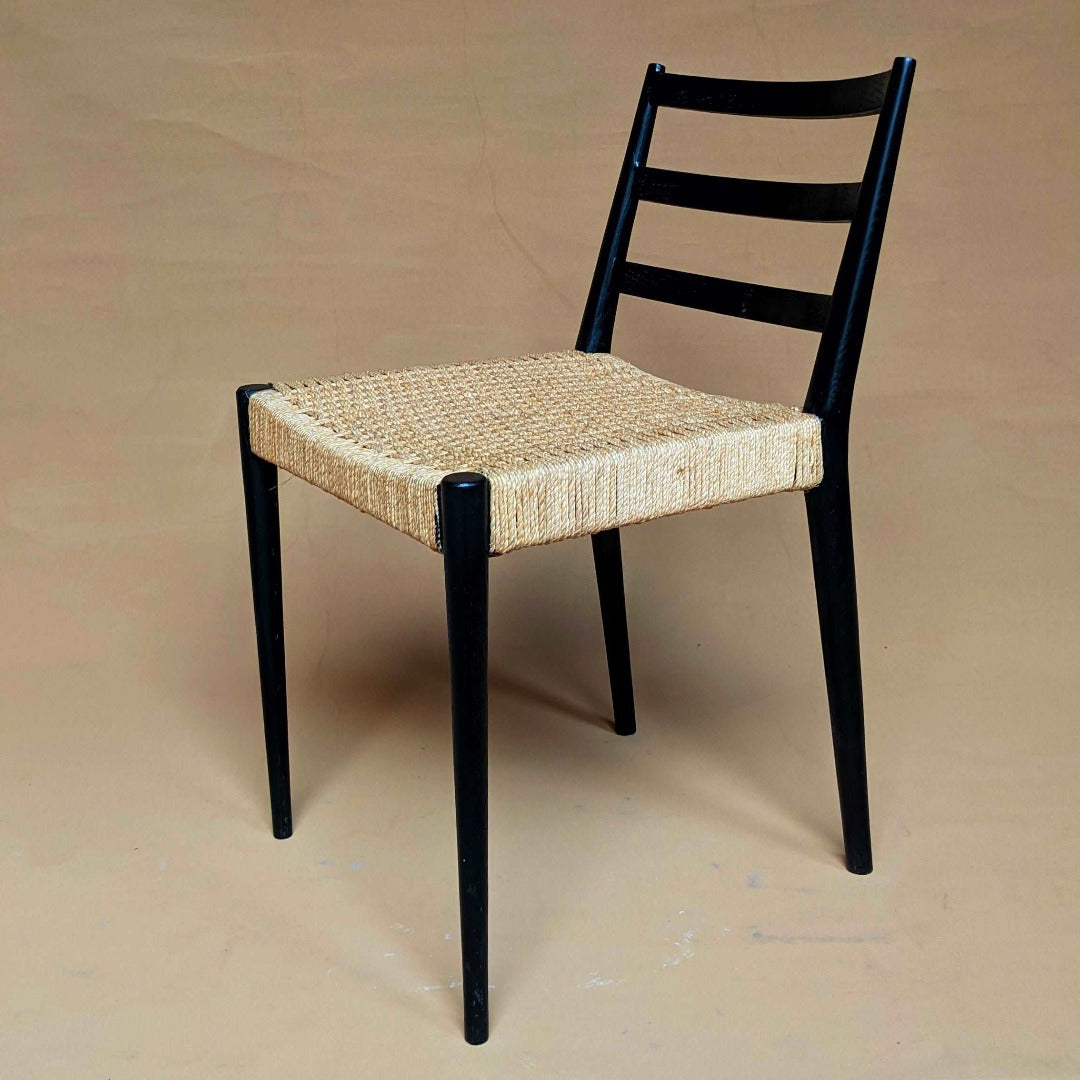 Lightweight and stylish chairs crafted from solid ash wood, blending durability with modern elegance.