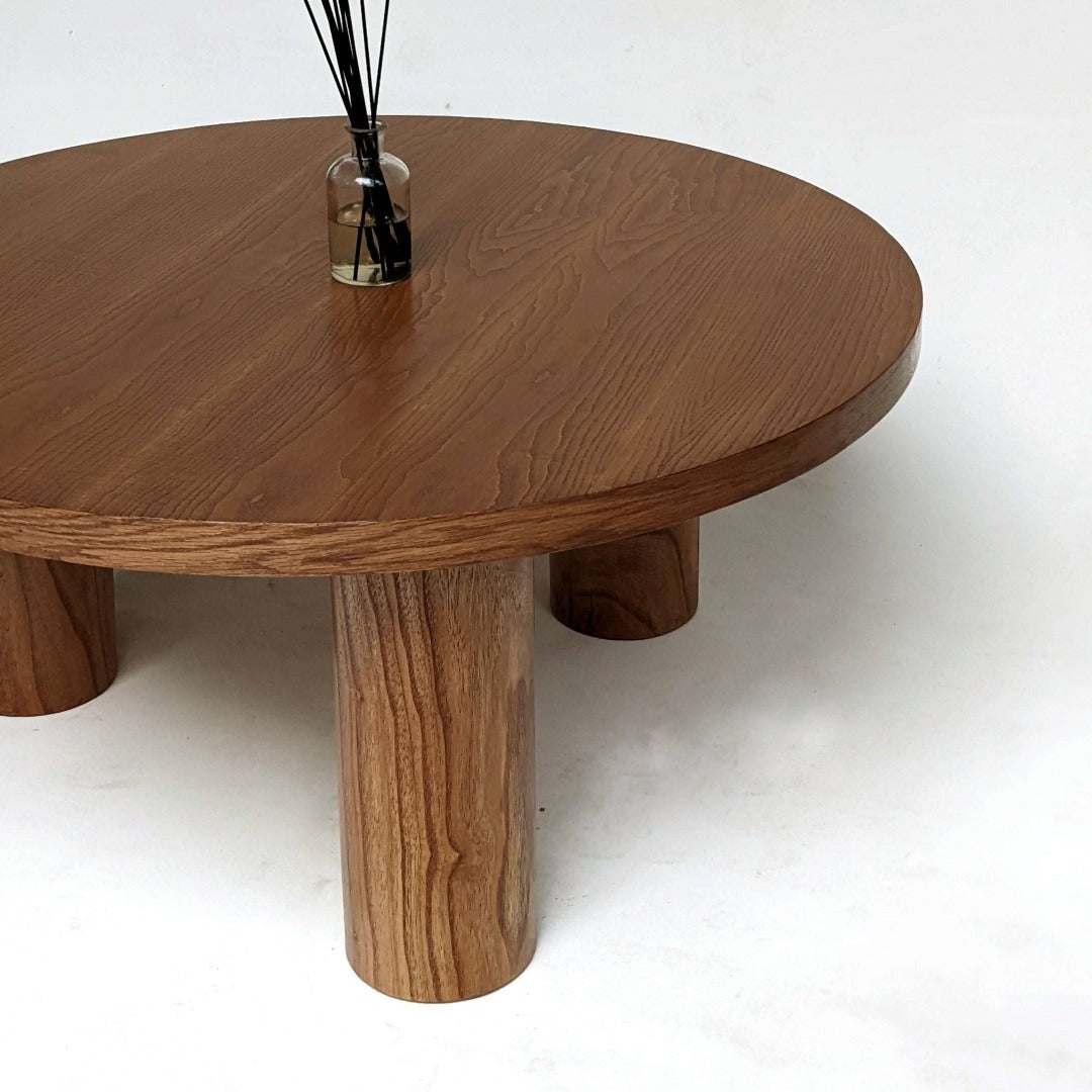 Effortlessly stylish, our Simple Round Coffee Table features solid wood legs and a Red Oak veneer top for a timeless aesthetic.