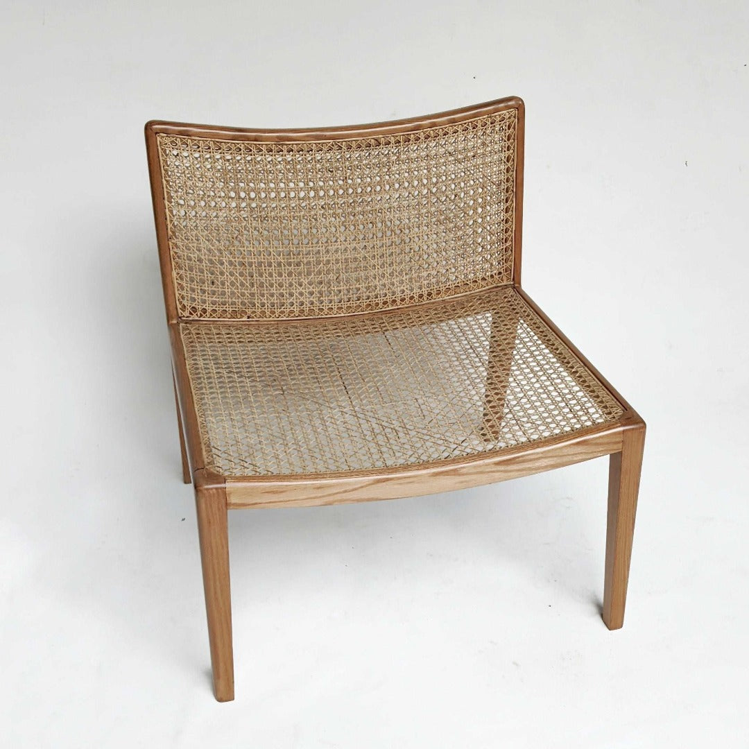 Rattan Lounge Chair: Embrace natural elegance with this inviting and stylish seating option.