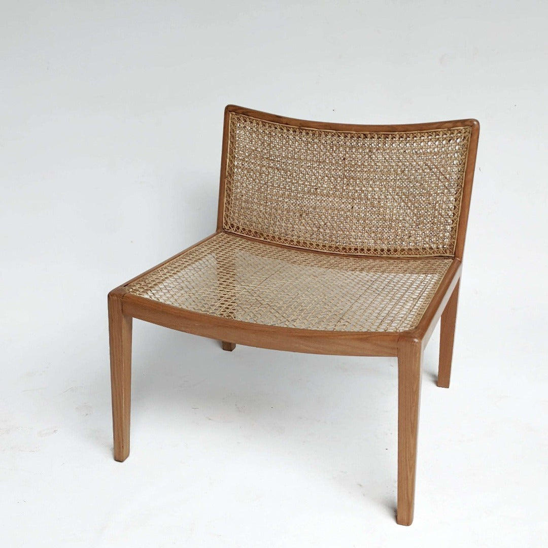 Rattan Lounge Chair: Embrace natural elegance with this inviting and stylish seating option.
