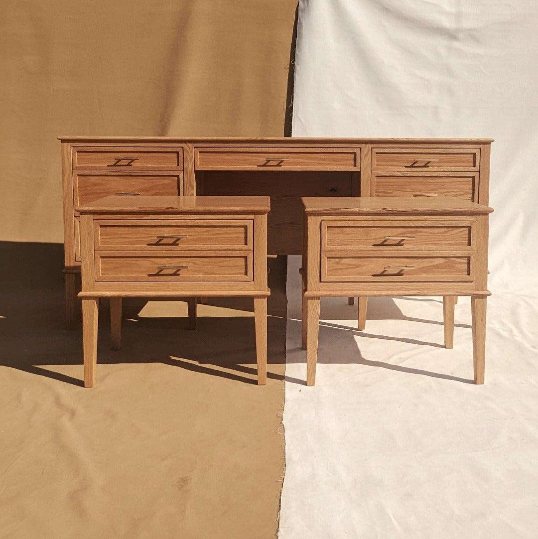 Graceful and refined side table crafted from Solid Red Oak and Red Oak veneer, accented with brass handles for an exquisite touch of sophistication.