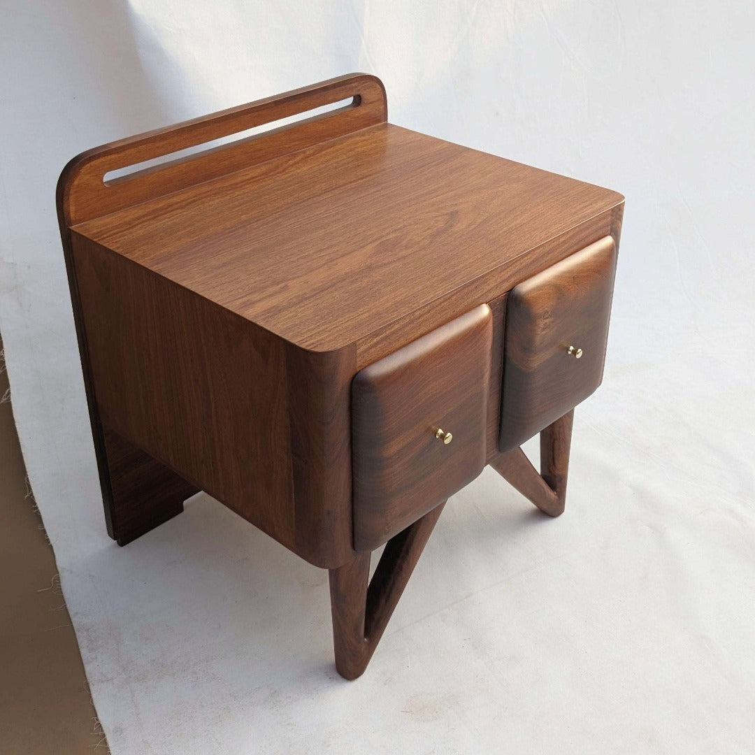 Mid-century nightstands crafted from Indian rosewood veneer and solid Indian rosewood, accented with brass handles for a touch of elegance.