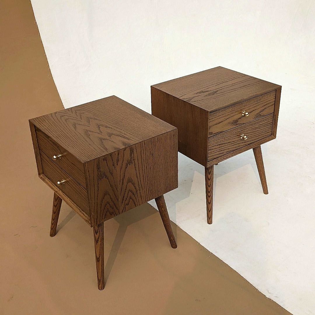 Mid-century modern design nightstands featuring a red oak veneer for a classic and stylish aesthetic.