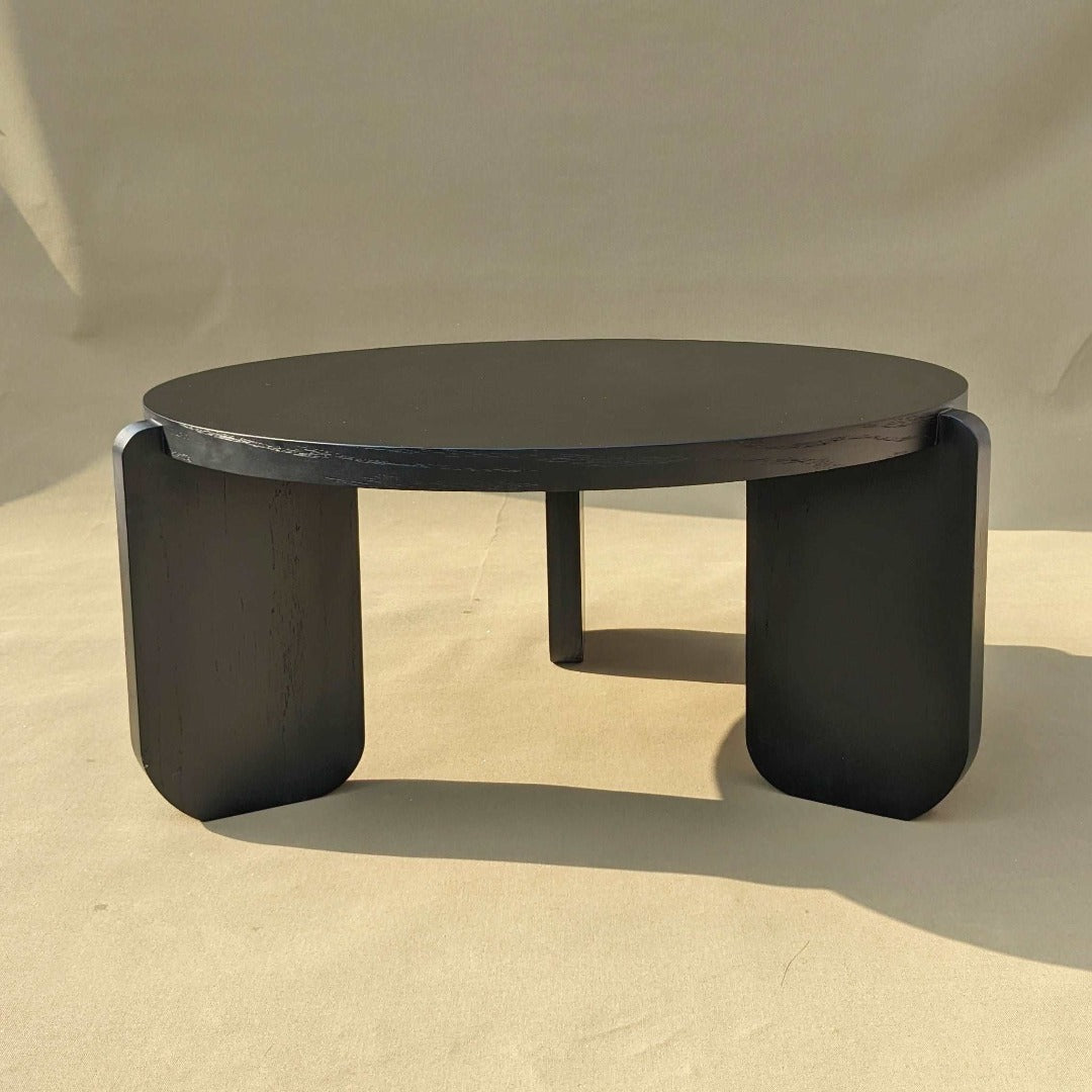 Sleek and Simple Round Coffee Table: A minimalist centerpiece for your living space, combining modern design with timeless elegance.