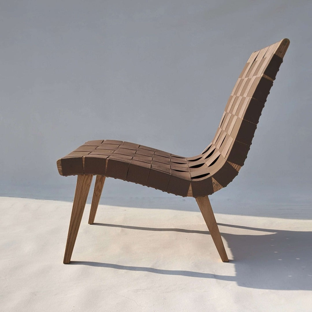 The epitome of comfort: a perfect lounging chair crafted from solid wood, enhanced with German outdoor coatings and waterproof webbing for unparalleled durability and relaxation.