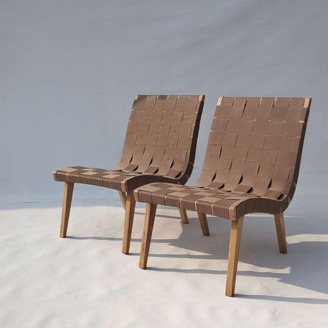 The epitome of comfort: a perfect lounging chair crafted from solid wood, enhanced with German outdoor coatings and waterproof webbing for unparalleled durability and relaxation.