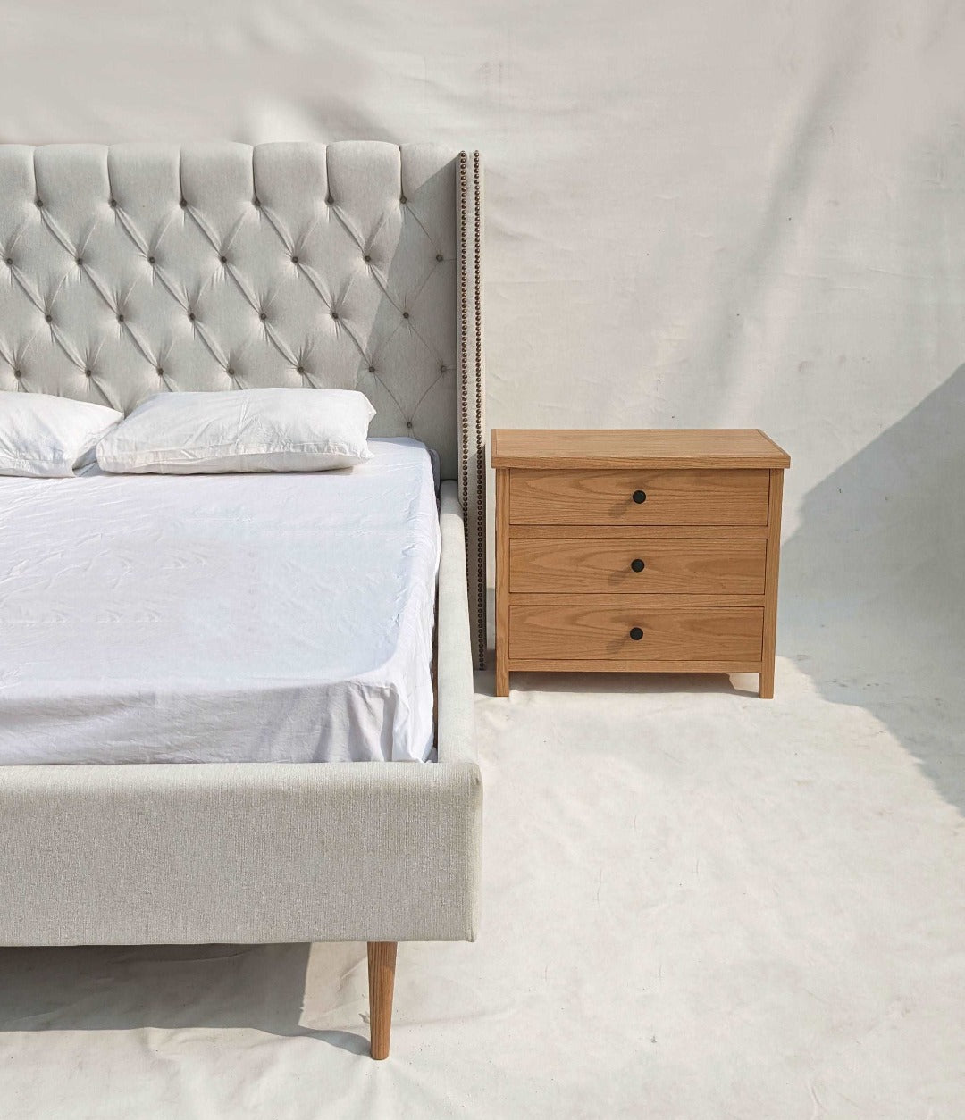 Embrace timeless comfort with our Cozy Classic Tufted Bed. Its elegant design and plush upholstery create a sanctuary of relaxation in any bedroom.