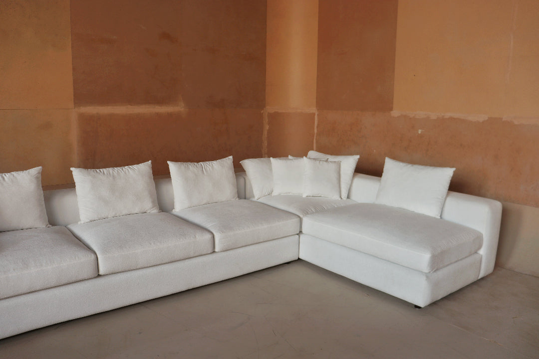 Monaco Sectional Sofa - A modern and spacious sectional designed for both comfort and style, featuring plush cushions, clean lines, and a minimalist aesthetic. Perfect for large living spaces, offering a cozy and elegant seating solution.
