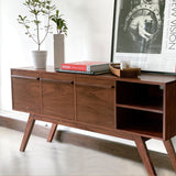 A mid-century console, showcasing the iconic design elements of the mid-20th century. With clean lines, tapered legs, and minimalist hardware, this console embodies the retro-modern aesthetic, offering timeless appeal and functionality for contemporary living spaces.