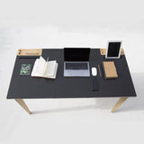 Sleek and functional Gazelle Desk featuring integrated slots for iPads, tablets, and phones, along with wire management for a tidy workspace. Includes ash wood holders to keep pencils and pens organized and within reach.