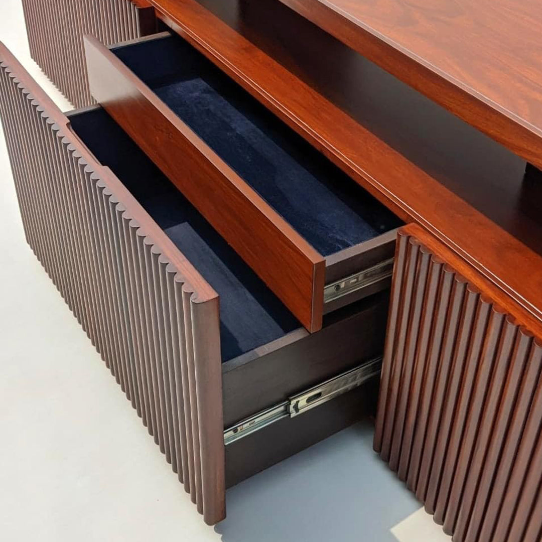 The Jane: A stylish two-tiered console featuring a smooth, solid Indian rosewood front. Includes convenient drawers and cabinets for storage.