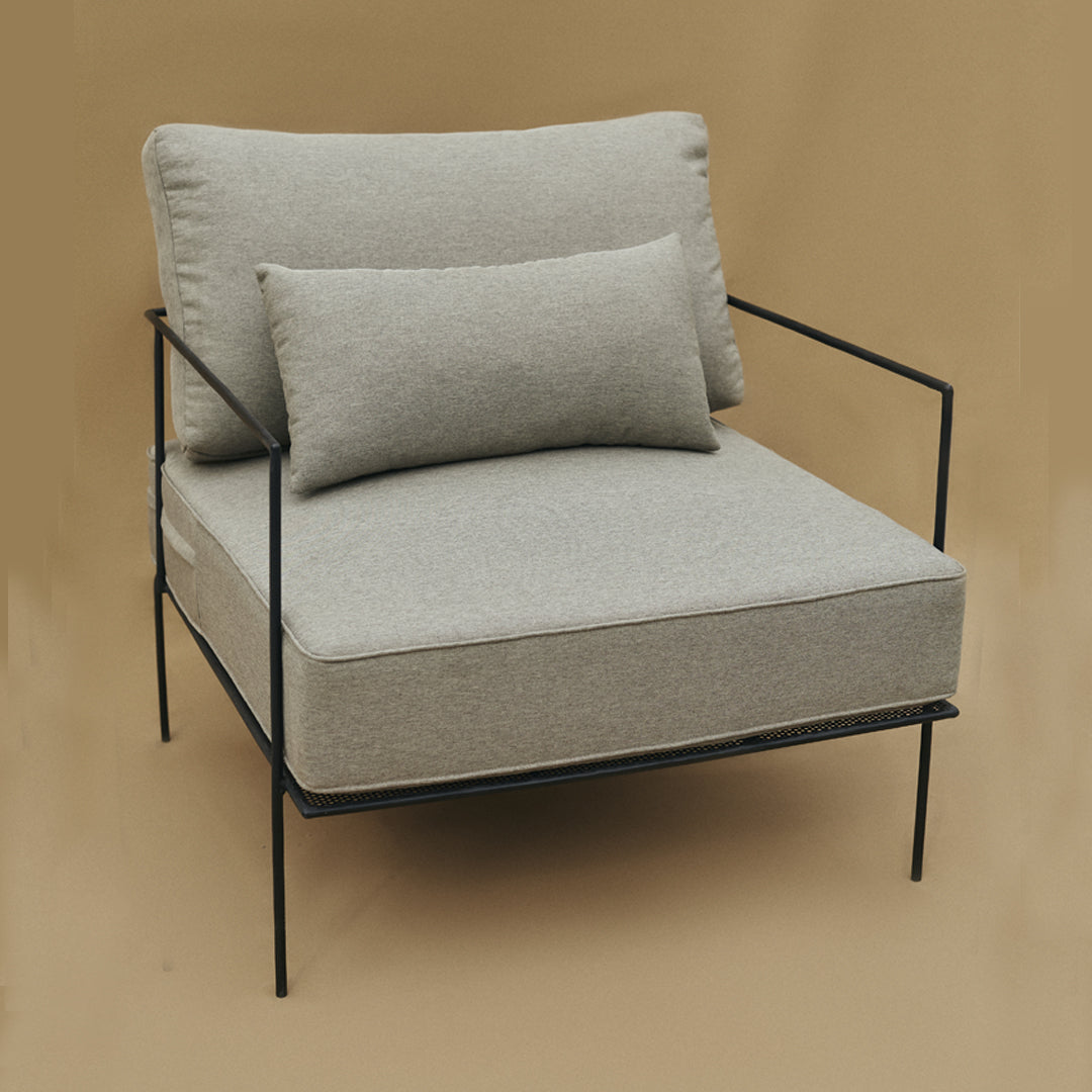 Contemporary Lounge chair featuring a sleek, minimal design for added comfort and style. Includes removable, washable cushion covers for easy maintenance and versatility.